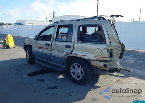 2001 Jeep Grand Cherokee Laredo из США, поврежденный, VIN 1J4GX48S51C653618